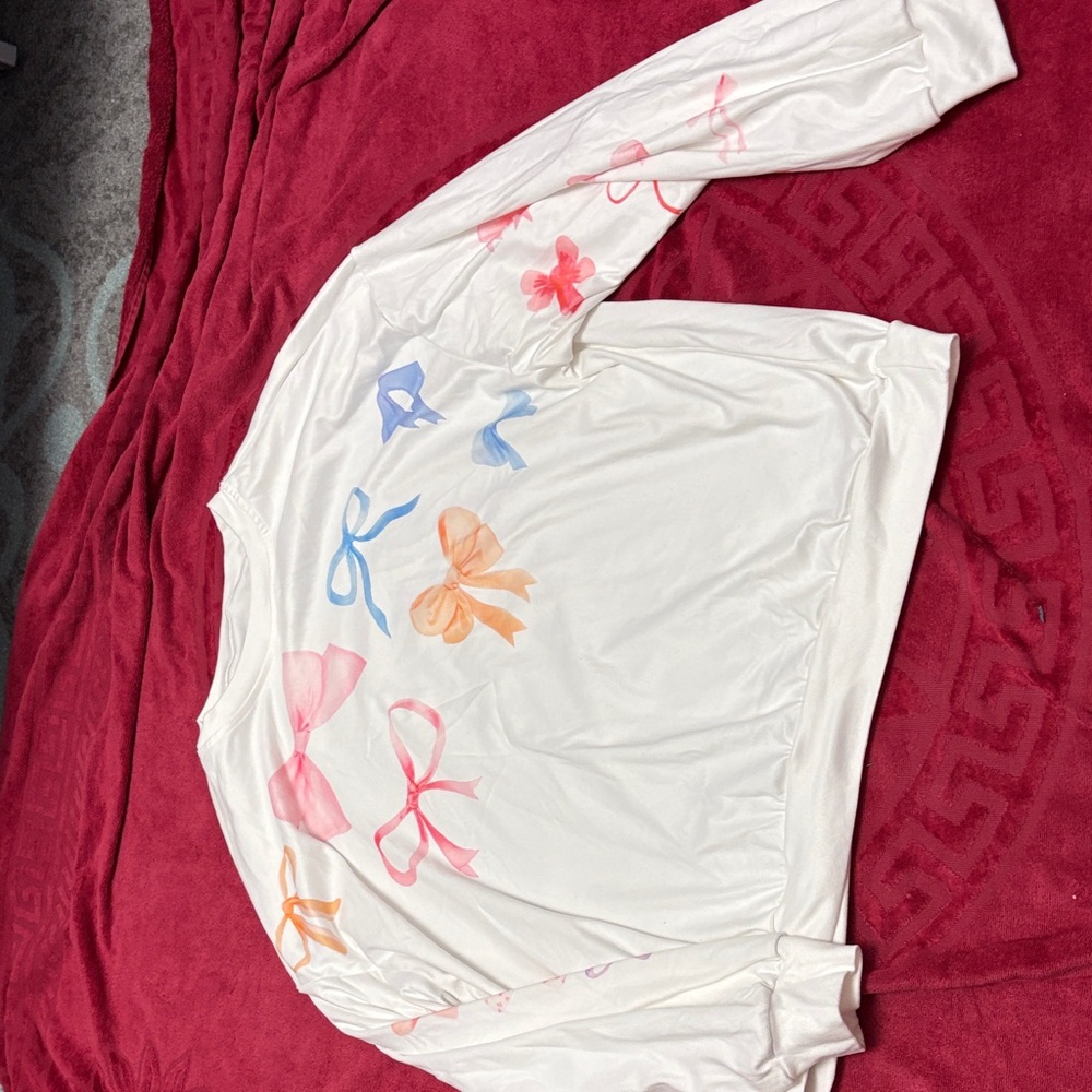 White Sweatshirt with Colorful Bow Designs